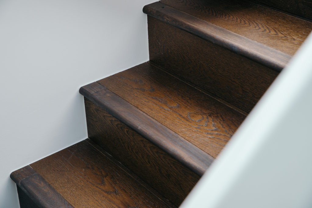 brown wooden stairs closeup image