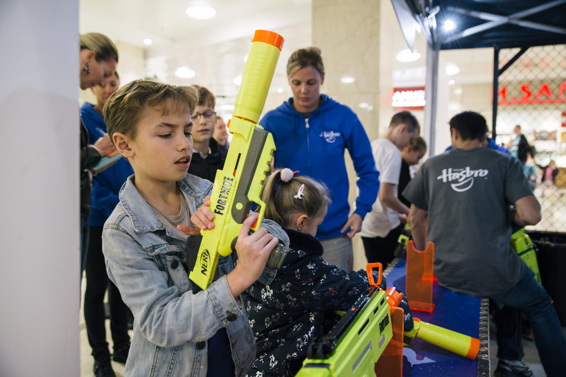 a kid loading nerf toy gun