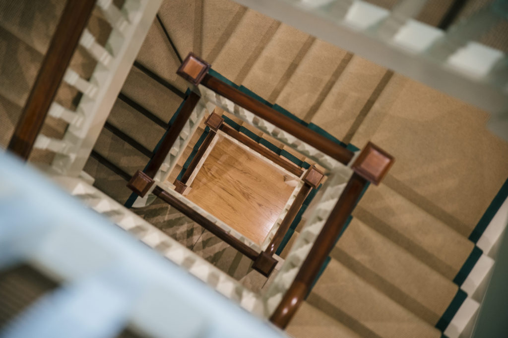 wooden square staircase view from the top