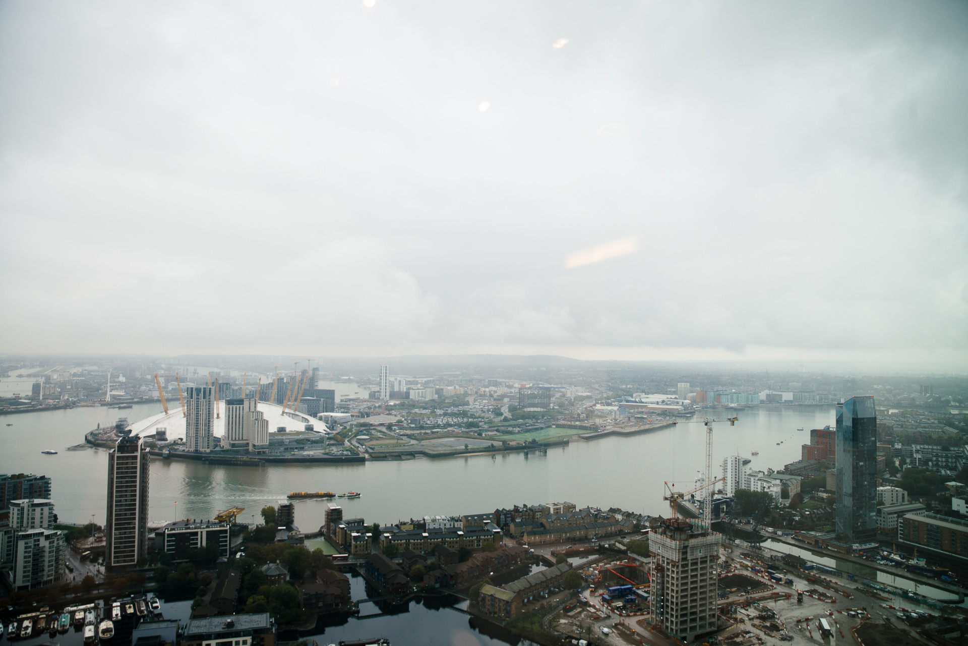 view over o2 london from canary wharf skyscrapper